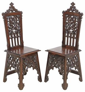 (2) FRENCH GOTHIC REVIVAL CARVED OAK SIDE CHAIRS: (pair) French Gothic Revival oak side chairs, late 19th c., pierced tracery-carved back, above the solid seat, on conforming supports, approx 45.75"h, 15.5"w, 16.5"d, sea