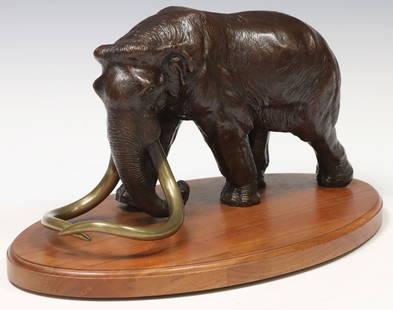TOM TISCHLER (B.1950) PATINATED BRONZE MODEL OF A MAMMOTH: Patinated bronze sculpture, Mammoth, signed in cast Tischler (Tom Tischler, American, active in Texas and Australia, b.1950), numbered 15/ 60, on a rotating walnut plinth, bronze: approx