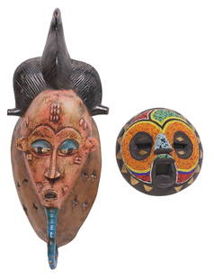 (2) WEST AFRICAN POLYCHROMED & BEADED MASKS: (lot of 2) West African carved wood masks, including: (1)&nbsp;likely Guro (Gouro/ Kweni)&nbsp;peoples, Ivory Coast, having elongated face with polychromed features, intact with restoration to protrud