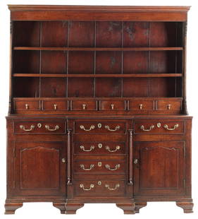 ENGLISH GEORGIAN PERIOD OAK TWO-PART OAK KITCHEN DRESSER: English Georgian two-part oak Welsh dresser, late 18th c., having two open shelves and six narrow drawers, lower case fitted with six drawers and two cabinet doors, flanked by spiral turned columns, o