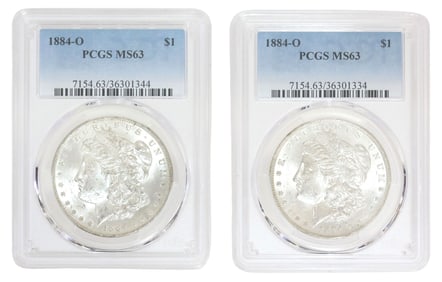 (2) U.S. MORGAN SILVER DOLLARS, 1884-O, PGA MS63