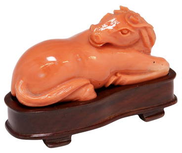 SMALL CHINESE CARVED  CORAL RECUMBENT HORSE SCULPTURE: Small Chinese carved orange&nbsp;coral sculpture, modeled as a recumbent horse, rising on stand, accompanied by fitted box,&nbsp;figure: approx 1 3/8&quot;h, 2 7/8&quot;w, 1.25&quot;d, overall on stan