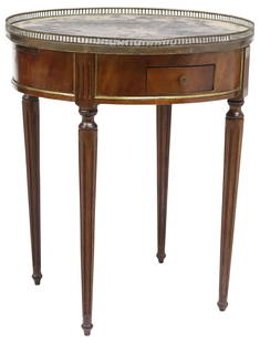 FRENCH LOUIS XVI STYLE MARBLE-TOP MAHOGANY BOUILLOTTE TABLE: French Louis XVI style mahogany bouillotte table, early 20th c., pierced gilt-metal gallery, enclosing circular marble top,&nbsp; apron fitted with two drawers, and two leather-inset slides, on taperi