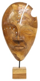 SOUTHEAST ASIAN CARVED TEAKWOOD FIGURAL MASK SCULPTURE
