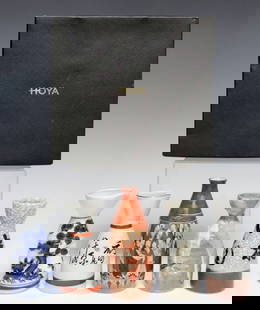 (10) JAPANESE PORCELAIN SAKE CARAFES & HOYA CRYSTAL LIQUEUR SAKE GLASSES: (lot of 10) Japanese ceramics and glasses, including: (5) porcelain sake carafes, varied in sizes and glaze, (one) parcel gilt with painted figural males, (one) blue and white with children, (tw