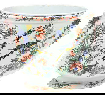 FRENCH ROUEN STYLE POLYCHROME FAIENCE JARDINIERE / PLANTER, 19TH C.: French polychrome tin-glazed earthenware planter/ jardiniere, likely from the Rouen, Normandy region, 19th c., with dual figural mask handles, among painted Chinoiserie birds, floral cornucopias, and