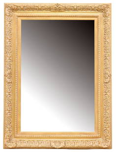 GILT PAINTED RECTANGULAR BEVELED PICTURE FRAME MIRROR: Rectangular gilt-painted picture frame wall mirror, late 20th c., having stepped frame with scrolled ornamentation, encasing beveled mirror plate, retaining Windsor Art Products Incorporated label ver