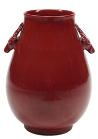 CHINESE SANG DE BOEUF PORCELAIN HU-FORM VASE WITH DEER HANDLES