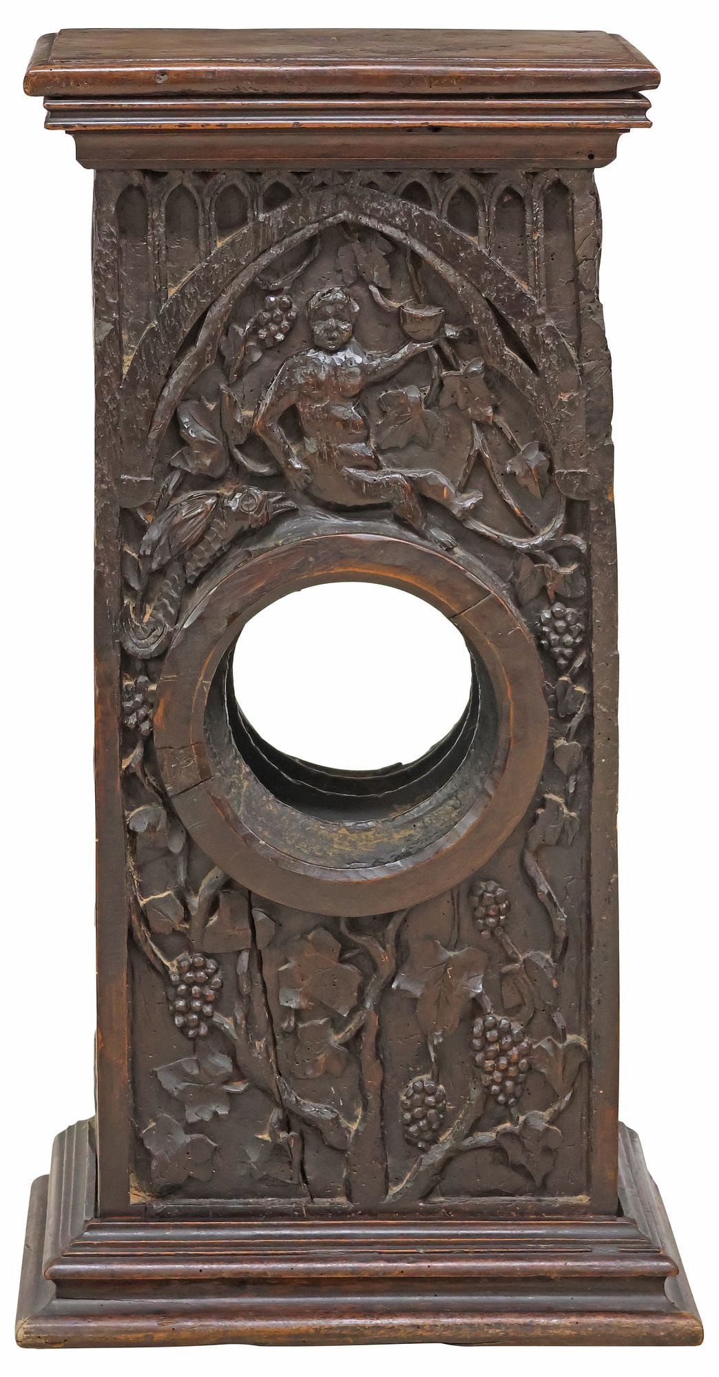 FRENCH CARVED WALNUT GRAPE PRESS-FORM PEDESTAL: French carved walnut pedestal/ plant stand, 18th/ 19th c., likely fashioned from a grape press, having stepped rectangular top, over standard with central spiraled cavity, surmounted by Bacchanalian f
