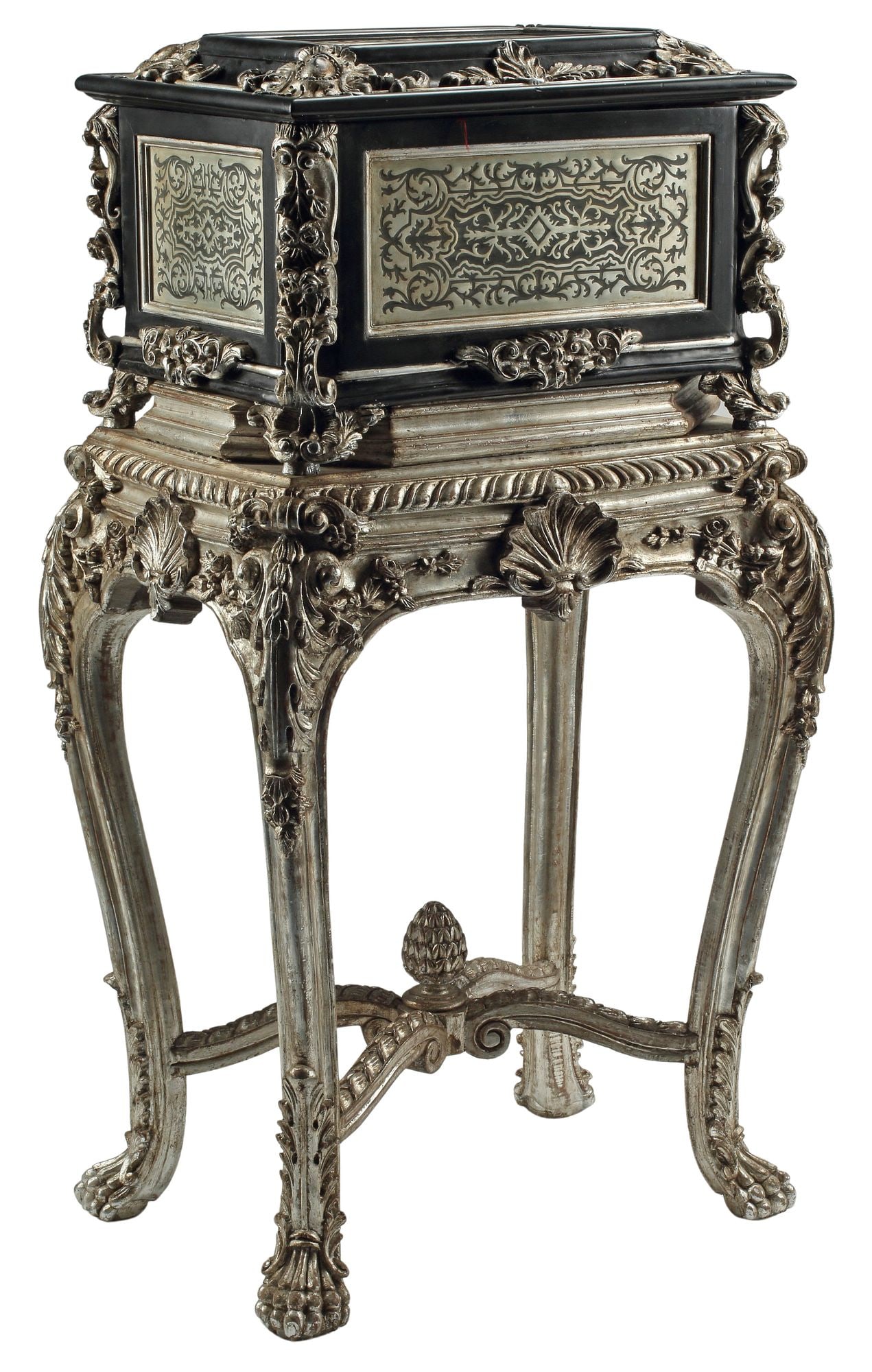 REGENCE STYLE METAL-INLAID CASKET ON SILVERED STAND: Regence style casket on stand, with Boulle-style metal inlay, sarcophagus-form in a black-painted finish, corners headed by foliated scrollwork, integral to elaborate silver-giltwood stand, cabriole l