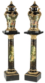 (2) SEVRES STYLE PAINTED MARBLE URNS ON PEDESTALS