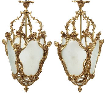 (2) LARGE LOUIS XV STYLE ORMOLU & ETCHED GLASS LANTERNS, 38"H: (pair) Large Louis XV style bronze dore and etched glass lanterns, each having tapered scrollwork frame with protruding figural masks, terminating on pointed drop finial, in need of wiring, approx 38&