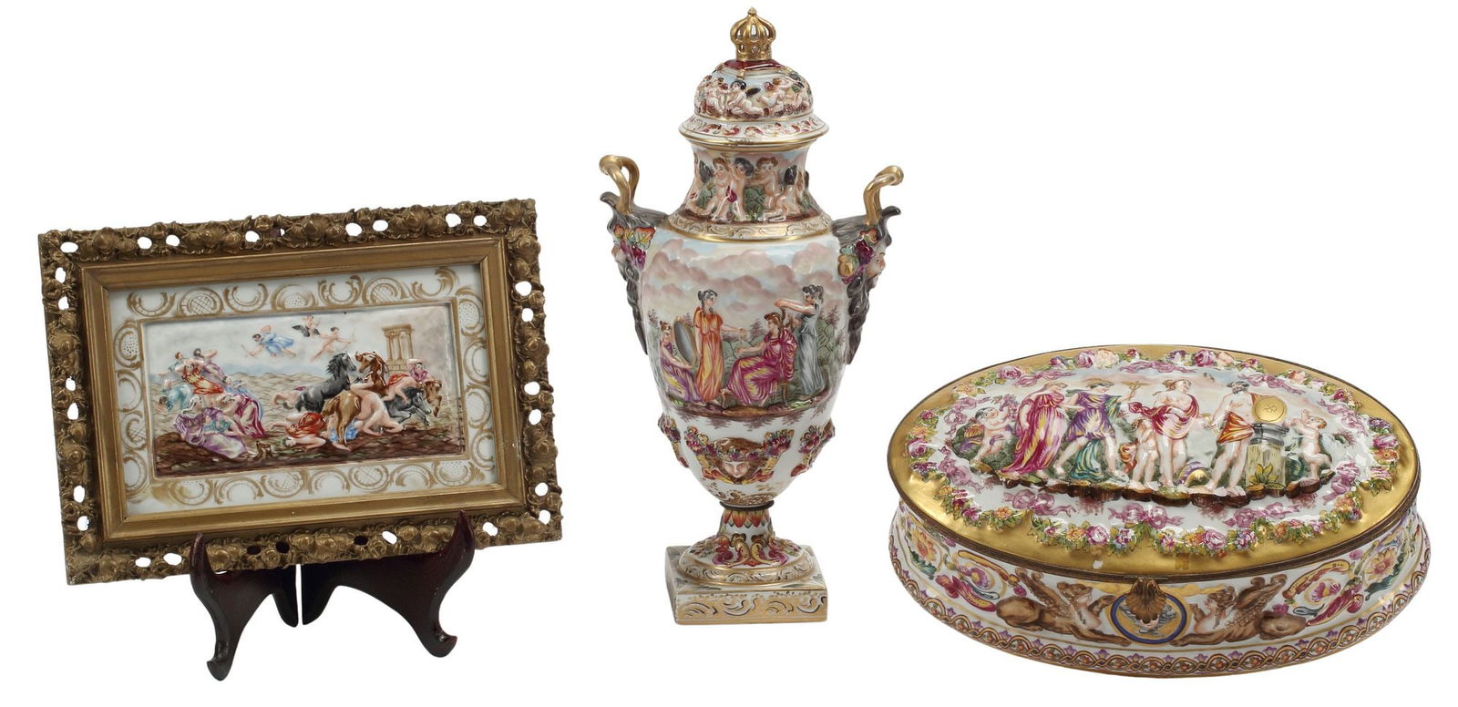 (3) CAPODIMONTE STYLE PORCELAIN RELIEF PLAQUE, BOX & VASE: (lot of 3) Capodimonte style porcelain cabinet items, each with classical motifs in relief, including: (1) oval table box, depicting various allegorical figures and Greek sphynx, with crown over N mar