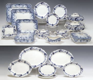 (50) ENGLISH FLOW BLUE DINNER SERVICE, WILLIAM ADAMS CO. & FORD AND SONS: (lot of 50) English flow blue ironstone partial dinner service, William Adams and Company, late 19th/ early 20th c., in the "Lily" pattern, each having scrolling floral motifs with parcel-gi