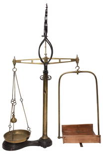 LARGE N.& T. AVERY CAST IRON, BRASS & COPPER BALANCE SCALES: Large English cast iron, brass, and copper balance scales, late 19th c., balance beam supporting two varied pans, rising on iron base, stamped N & T. Avery, accompanied by one weig