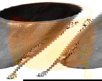 LARGE VICTORIAN HAND-HAMMERED COPPER JARDINIERE/ LOG BIN: English Late Victorian&nbsp;hand-hammered&nbsp;copper jardiniere/ log bin, late 19th c., dual brass side handles,&nbsp;on&nbsp;paw feet, approx 15.25&quot;h, 25&quot;w, 22&quot;d