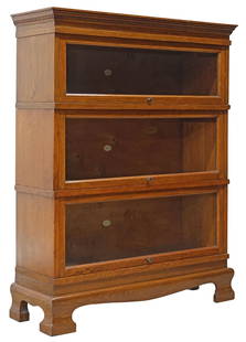 ENGLISH OAK THREE-STACK BARRISTER BOOKCASE: English oak lawyer&#39;s bookcase, Simpoles Chapter Bookcase, early 20th c., dentil-molded cornice, three stacked sections with glazed doors,&nbsp;on ogee bracket feet, approx 46&quot;h, 36&quot;w, 12