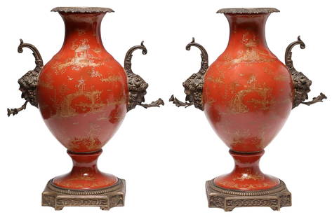 (2) METAL-MOUNTED PORCELAIN CHINOISERIE BALUSTER VASES: (pair) Decorative metal-mounted porcelain vases, 20th c., each having foliate rim and dual figural mask handles, parcel-gilt chinoiserie motifs on red ground, United Wilson Porcelain Factory (Hon