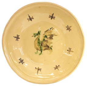 CONTINENTAL POTTERY CHARGER DECORATED WITH A WYVERN