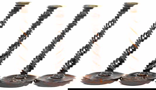 (4) ENGLISH CARVED OAK & BRASS BARLEY TWIST CANDLESTICKS: (lot of 4) English carved oak barley twist candlesticks, early 20th c., comprising two pairs, each with brass bobeche, and dished round base, including: (2) approx 12.25"h, 5.5"diam; (2