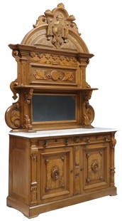 AMERICAN VICTORIAN CARVED WALNUT MARBLE-TOP SIDEBOARD, ST. LOUIS, MISSOURI: American Victorian Renaissance Revival carved walnut sideboard, J.H. Crane Furniture, St. Louis, Missouri, late 19th c., having arched crest with central shield cartouche, above open shelf and flat mi