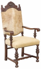 RENAISSANCE REVIVAL CARVED OAK LEATHER & HIDE-UPHOLSTERED ARMCHAIR