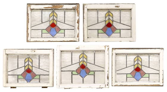 (5) ENGLISH ARCHITECTURAL STAINED & LEADED GLASS WINDOWS: (lot of 5) English architectural stained and leaded glass windows, early 20th c., white painted wood frames, encasing clear and multicolored textured glass panels, forming central geometric pattern,&n
