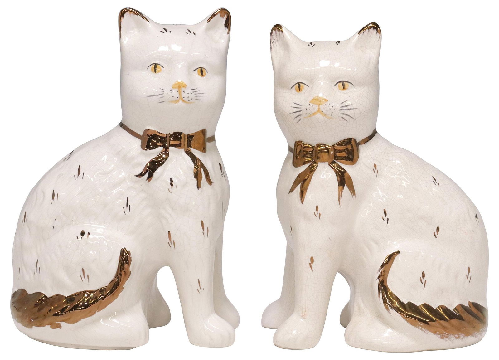 (2) ENGLISH STAFFORDSHIRE LUSTER MANTEL CATS: (pair) English Staffordshire mantle cats, 20th c., each modeled as a seated cat with copper luster painted features, tied ribbon collar, approx 8"h, 5.5"w, 4"d, 2.25lbs total