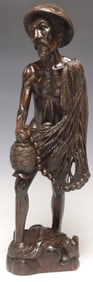CARVED HARDWOOD FIGURE OF A BALINESE FISHERMAN