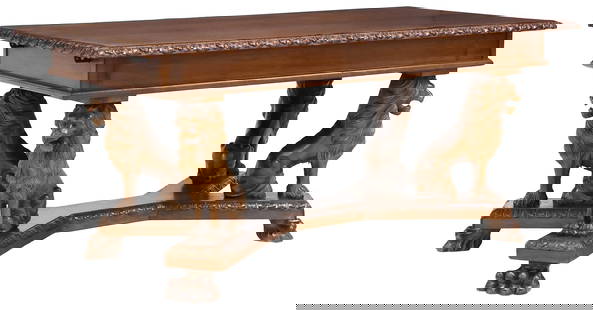ITALIAN RENAISSANCE REVIVAL CARVED WALNUT LIONS EXTENSION TABLE: Italian Renaissance Revival carved walnut extension dining table, early 20th c., having rectangular top with ornamented edge, dual pull-out slides on either side to support leaves, rising on figural s