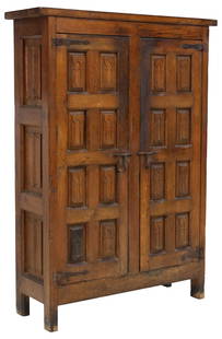 SPANISH BAROQUE STYLE OAK TWO-DOOR CUPBOARD: Spanish Baroque style oak cupboard, 19th c., two cabinet doors with raised paneling, on iron strap hinges, approx 59"h, 41.75"w, 14.25"d