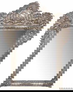 SPANISH COLONIAL STYLE STERLING-CLAD REPOUSSE WALL MIRROR, 41" X 31.5": Spanish Colonial style sterling-clad repousse wall mirror, 20th c., silver cladding on wood frame, having scalloped crest with central shield, flanked by cornucopias and floral medallions, ribbon-twis