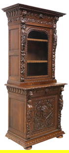 FRENCH RENAISSANCE REVIVAL CARVED & GLAZED OAK BUFFET, 90"H: French Renaissance Revival carved oak cabinet/ buffet, 19th c., having molded cornice, above single glazed cabinet door, revealing adjustable height shelving, framed by carved figural busts over grape
