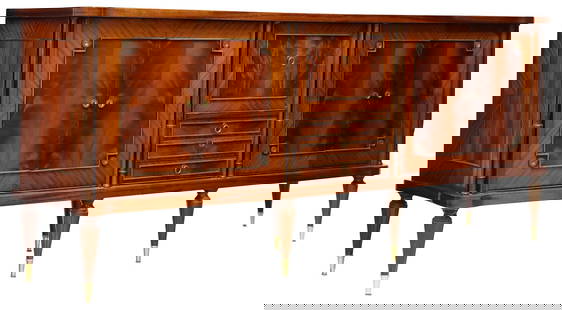 FRENCH LOUIS XVI STYLE MAHOGANY SIDEBOARD: French Louis XVI style mahogany sideboard, 20th c., centered fall-front bar cabinet above three felt-lined drawers, flanked on either side by pairs of cabinet doors, on tapering fluted legs, approx 39