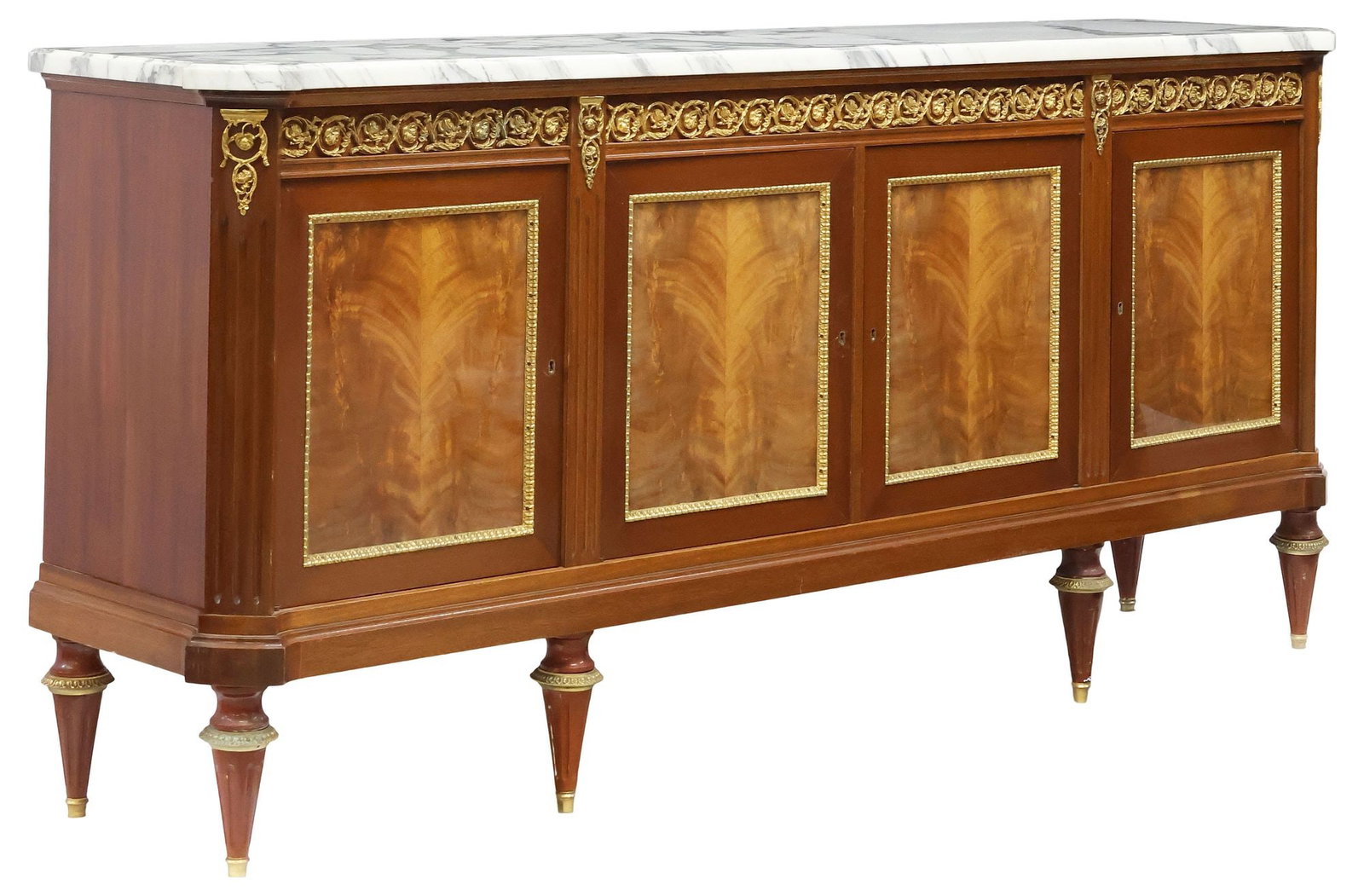 FRENCH LOUIS XVI STYLE MARBLE-TOP MAHOGANY SIDEBOARD: French Louis XVI style mahogany sideboard, 20th c., shaped marble top, above frieze mounted with gilt-metal rinceau, four cabinet doors, center left cabinet enclosing four drawers, the others revealin