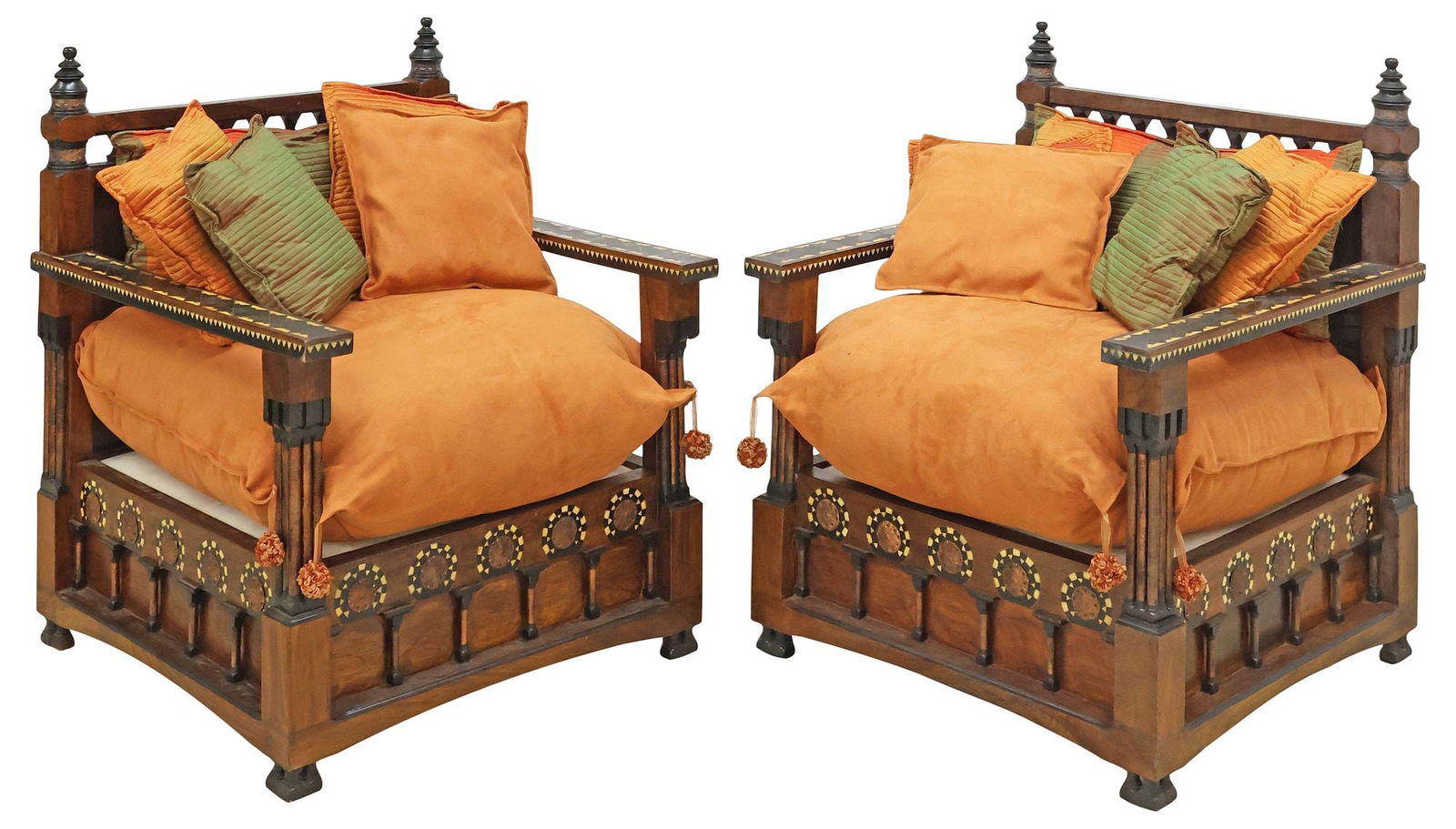 (2) MANNER OF CARLO BUGATTI PARCEL-EBONIZED & INLAID LOW ARMCHAIRS: Moroccan Moresque copper-clad wood armchairs, in the manner of Carlo Bugatti (Italian, 1856-1940), 20th c., colonnaded crest rail over paneled back, parcel-ebonized arms inlaid contrasting wood and bo