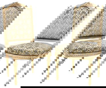 (2) FRENCH LOUIS XVI STYLE PAINTED & UPHOLSTERED SIDE CHAIRS: (pair) French Louis XVI style painted-decorated side chairs, early 20th c., having ribbon crest flanked by turned finials, above padded back, seat, and armrests in blue relief-patterned jacquard&nbsp;