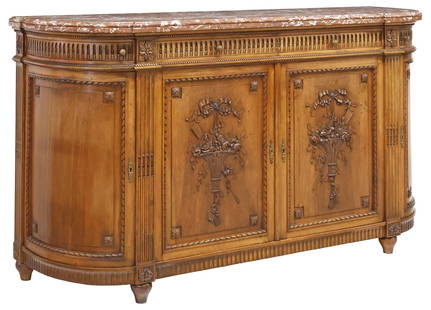 LOUIS XVI STYLE MARBLE-TOP CARVED WALNUT DEMILUNE SIDEBOARD: French Louis XVI style carved walnut demilune sideboard, early 20th c., having shaped marble top, four fluted drawers, over four cabinet doors, with carved ribbon motifs and fruit-filled baskets, open