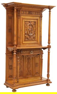FRENCH RENAISSANCE REVIVAL CARVED WALNUT CREDENCE: French Renaissance Revival carved walnut credence cupboard, 19th c., dentil-molded cornice, cabinet door carved with an oval medallion of Venus and Cupid, enclosing two adjustable-height shelves, stan