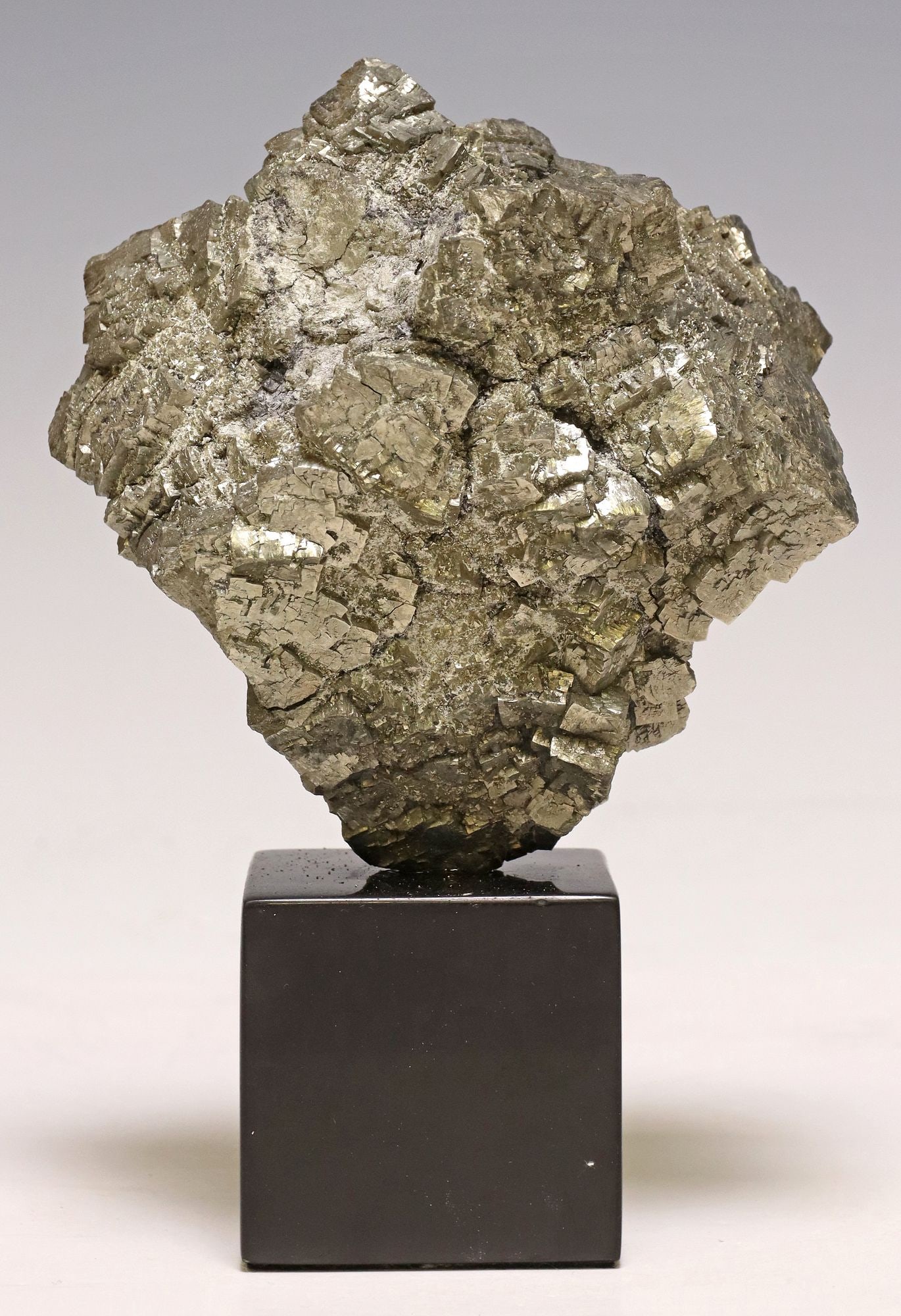 GEOLOGICAL PYRITE CLUSTER ON BLACK MARBLE BASE (1 of 3)
