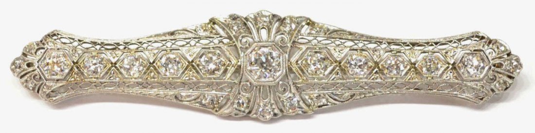 ESTATE PLATINUM & 2 CT DIAMOND FILIGREE BAR BROOCH: Edwardian platinum and 2.00 ct (tw) diamond bar brooch, the filigree frame containing: (1) old European-cut central diamond, approx 4.50mm diameter (average), approx 0.35ct, clarity: SI1, color: G-H-I