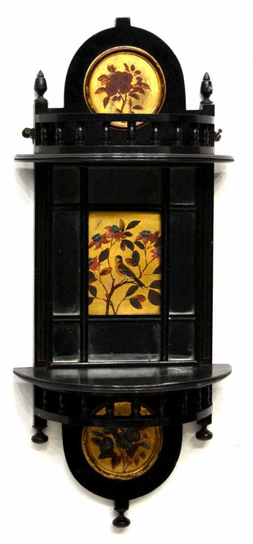 ENGLISH ARTS & CRAFTS EBONIZED MIRRORED WALL SHELF: English Arts and Crafts wall shelf, the ebonized wood frame set with mirrored and gilded panels showing a bird among blooming branches,some age and spotting to mirror, 35"h, 14.75"w, 8"d, 11.75lbs Sta