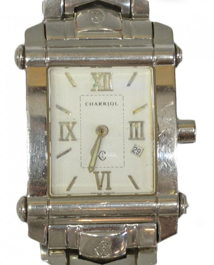 GENTS PHILIPPE CHARRIOL COLUMBUS WRISTWATCH: Gents Philippe Charriol wristwatch, Columbus model, the rectangular face marked with roman numerals at 3, 6, 9 and 12, date window below the 3 o'clock mark, Swiss made, flexible stainless steel band,