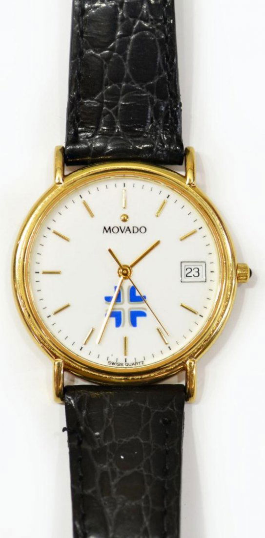 GENTS MOVADO WATER RESISTANT WRISTWATCH: Gents Movado wristwatch, gilt bezel enclosing the circular white face marked at minutes, date window at 3 o'clock, water resistant, black leather band, model 87-A4-0887, marked 8298437 verso, wear to