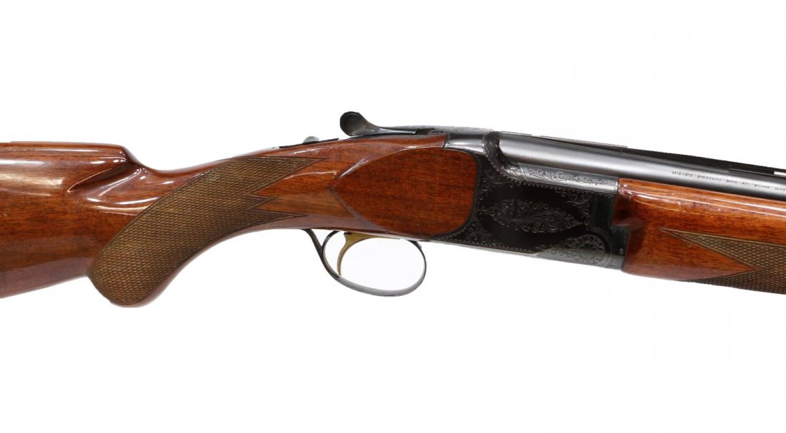 MIROKU OVER & UNDER 20 GAUGE SHOTGUN: Miroku over under shotgun, Japan, (producer of Browning and Charles Daly shotguns), 20 gauge, 26" vent rib barrel, foliate engraved receiver, gilt trigger, checkered stock, barrel selector, SN 361XXX 