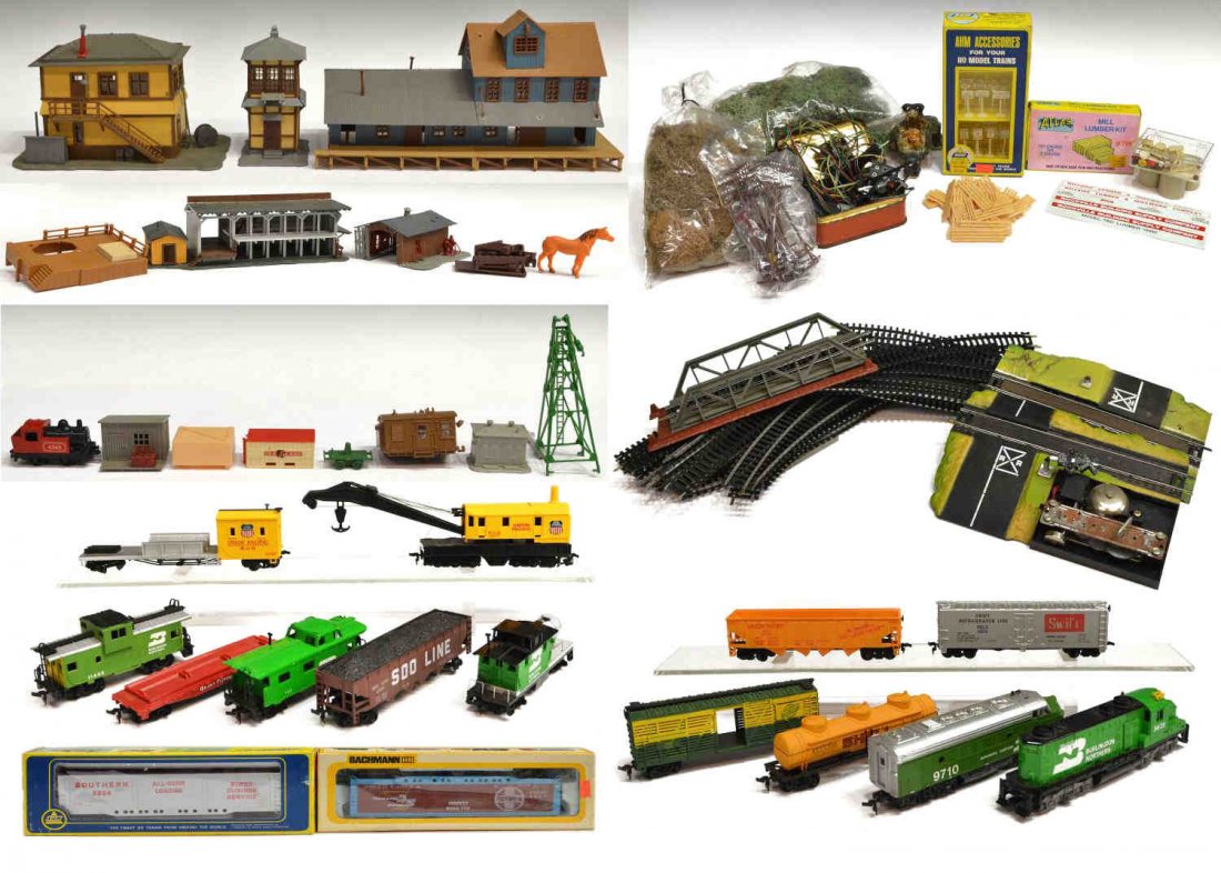 COLLECTION ASSORTED TRAINS, TRACK, BUILDINGS: (lot) Large group of assorted trains, track, buildings, and accessories, ect., including Bachmann Burlington Northern locomotive #9710, Bachmann Union Pacific M of W 12277 flat car with crane, Tyco Bu
