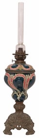 ART NOUVEAU PATINATED METAL & MAJOLICA 'KOSMOS' OIL LAMP