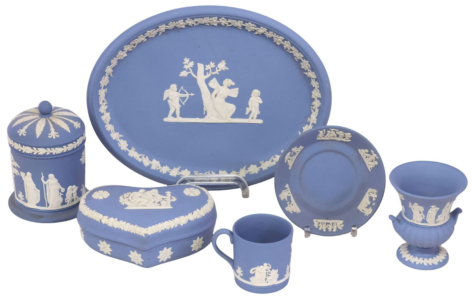 (6) ENGLISH WEDGWOOD BLUE JASPERWARE TABLE & VANITY ARTICLES: (lot of 6) English Wedgwood Jasperware table and vanity articles, each with Neoclassical figures in relief, against a light blue bisque ground, maker's mark underfoot, including: (1) small urn, approx