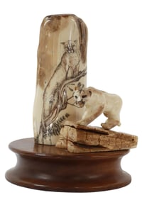 SIGNED SCRIMSHAW FOSSILIZED WALRUS TUSK, COUGARS