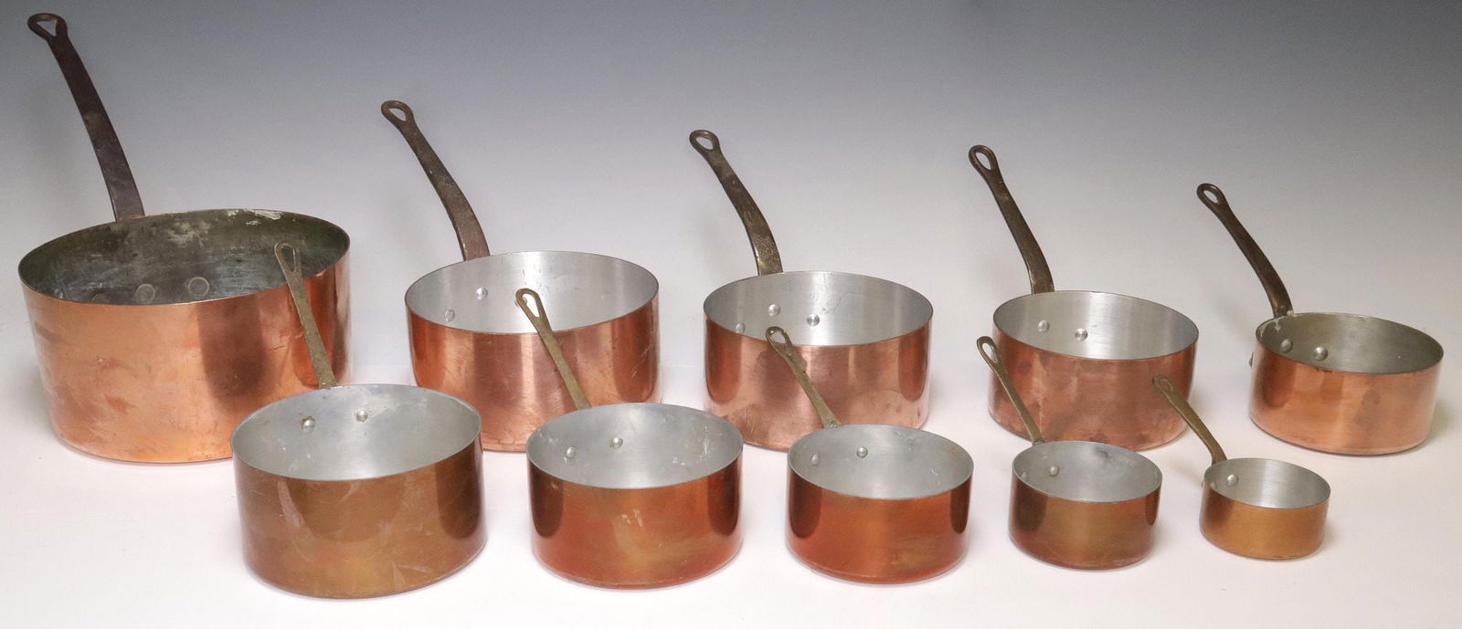 (10) FRENCH GRADUATED COPPER SAUCEPANS, TWO ASSEMBLED SETS (1 of 3)